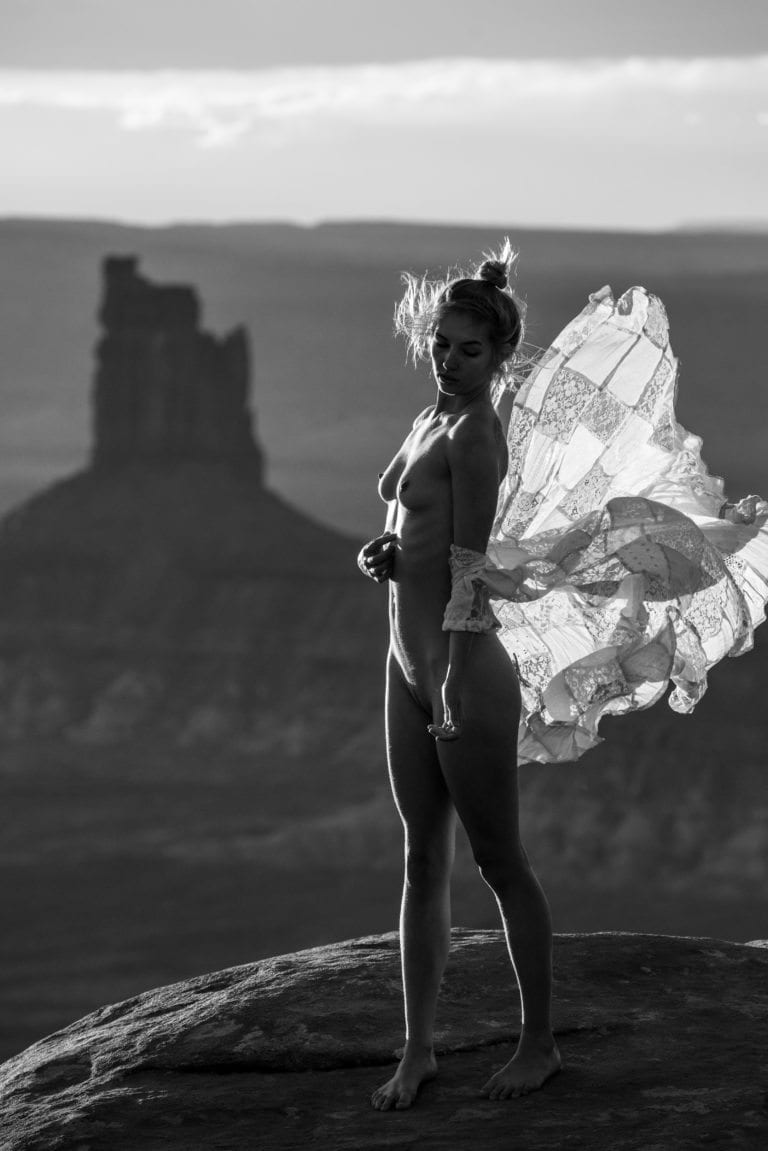 Grace Nielson flashes her nude body on the edge of a desert mesa