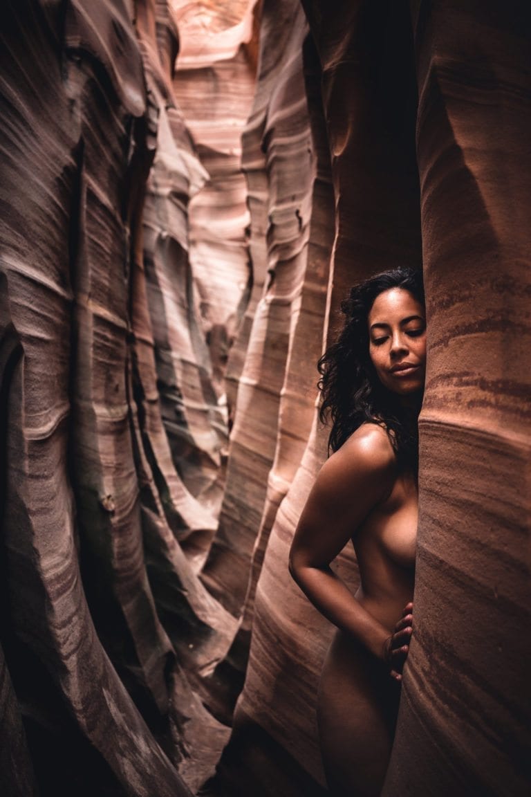 A nude woman embraces the walls of Zebra Canyon for Dylan H Brown nude series, Impermanence