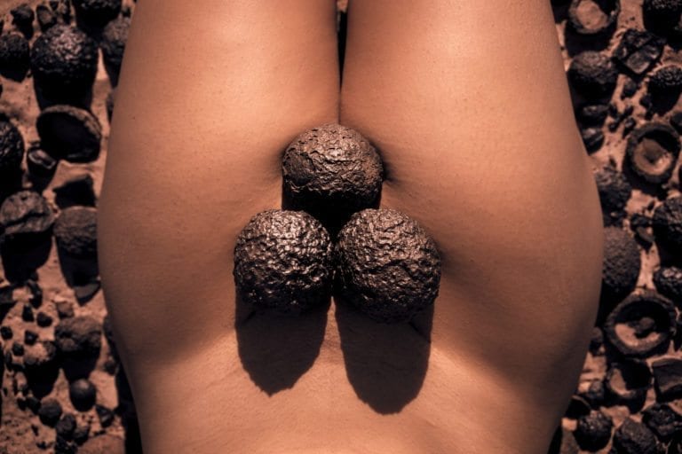 Moqui balls on a naked woman