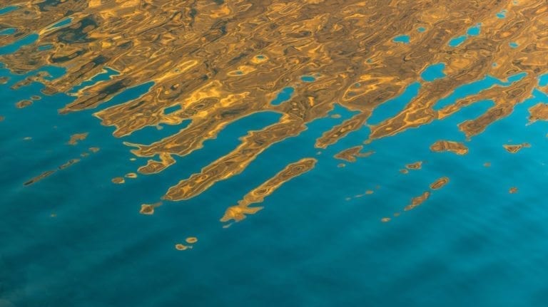 Gold and blue reflections in the water