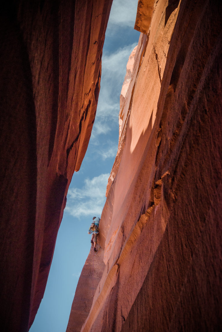 A climber works his way up a route in Indian Creek, Utah