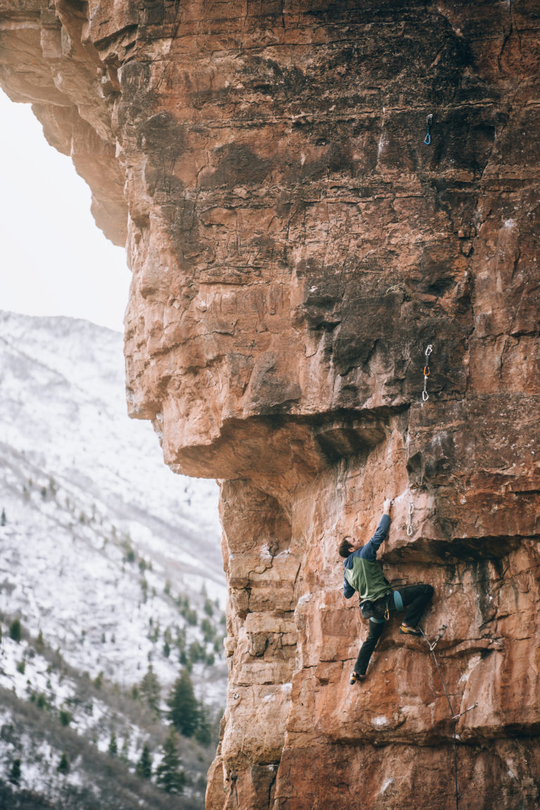 A man climbs a route at Main Elk outside New Castle Colorado.