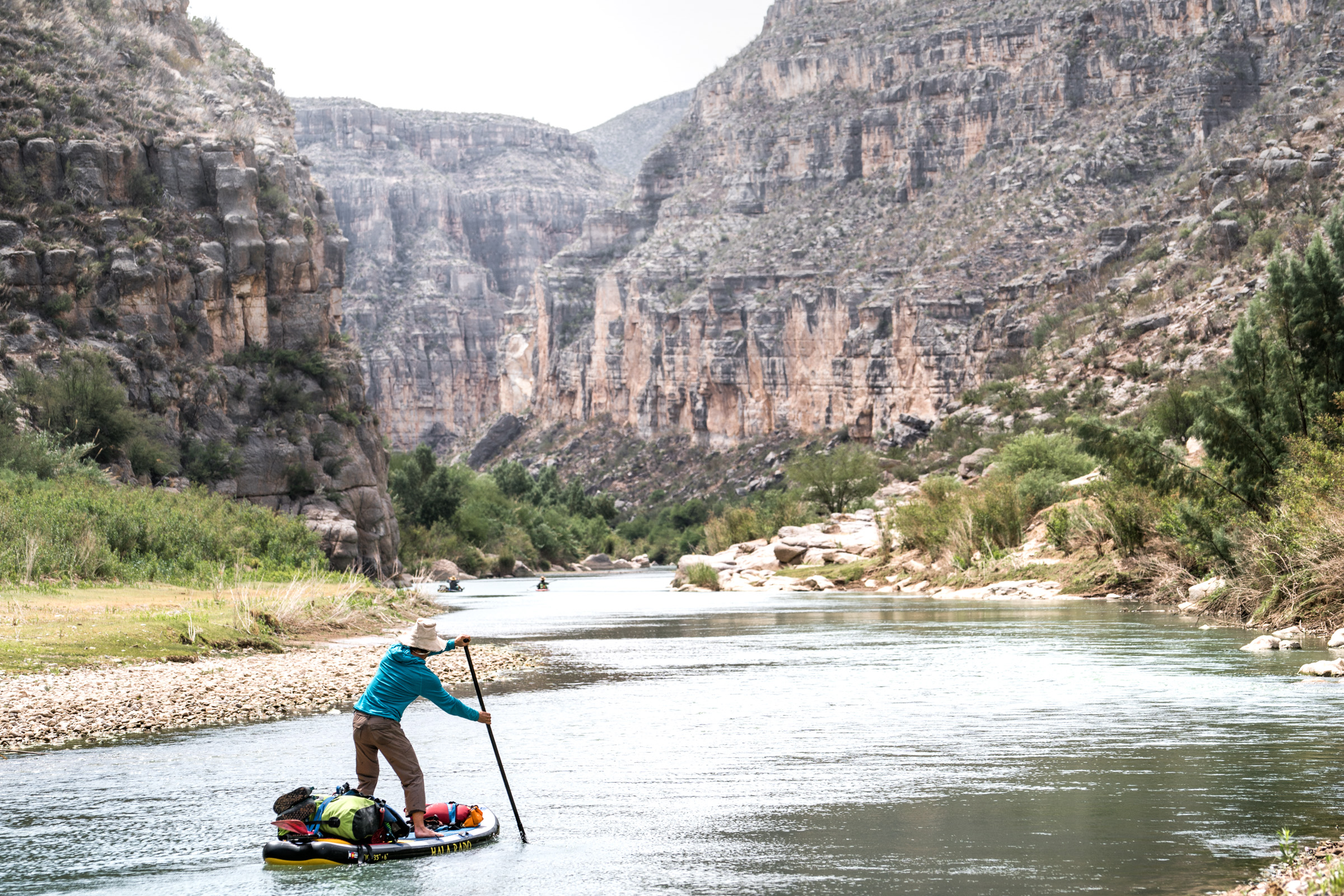 Pete paddles a Hala board into the gates of the Lower Canyons